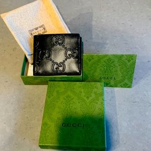 Gucci wallet NWT. Black, luxury, leather.